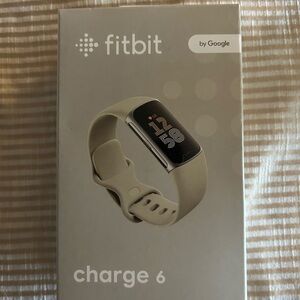 Fitbit Tracker with Silver Face and White Band